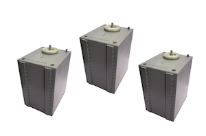 energy storage capacitors, three grey capacitors diagonally aligned.