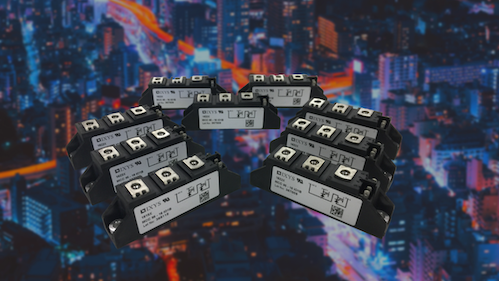 Black and white diode modules on a bright, city lights background
