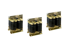 Three black and gold dry type transformers